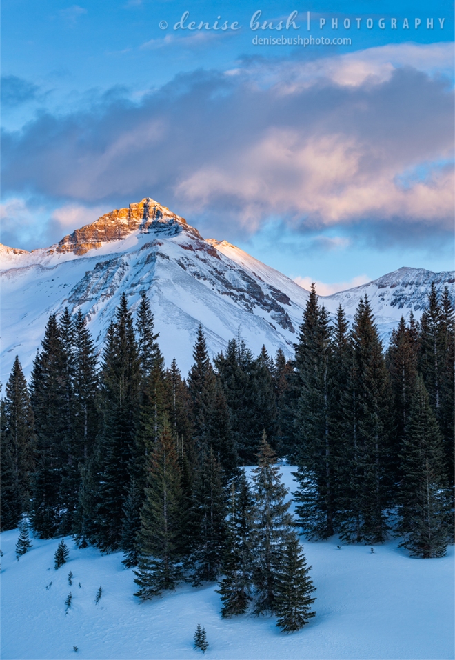 Last light of day strikes an exposed peak in the San Juan Mountains, San Miguel County, Colorado.