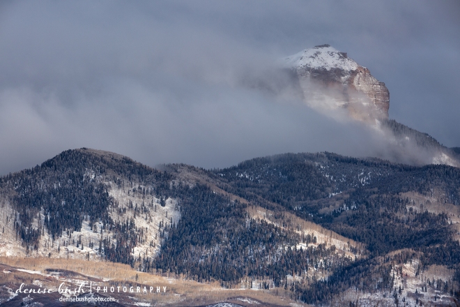 A clearing storm lifts revealing Courthouse Mountain of the Cimarrons, in the San Juans of Colorado.